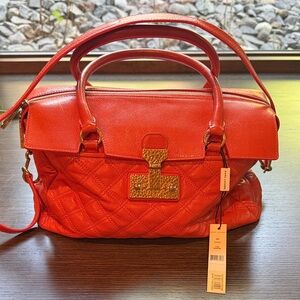 Marc Jacobs “Rudi” satchel in Mandarin (orange)—a quilted leather designer bag.